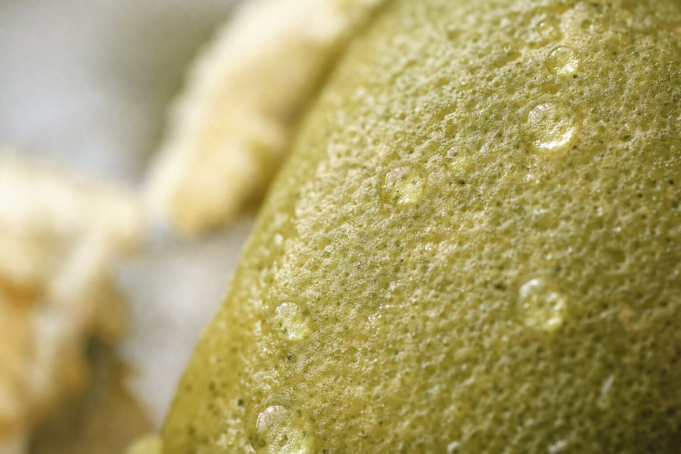Macro texture of bergamot citrus peel and oil